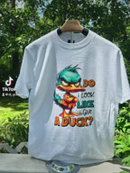 Video of cotton fabric detail of sarcastic duck graphic shirt.