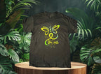 Video of Black t-shirt with a green butterfly with jungle background 