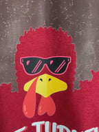 Close up of focal point funky turkey shirt.