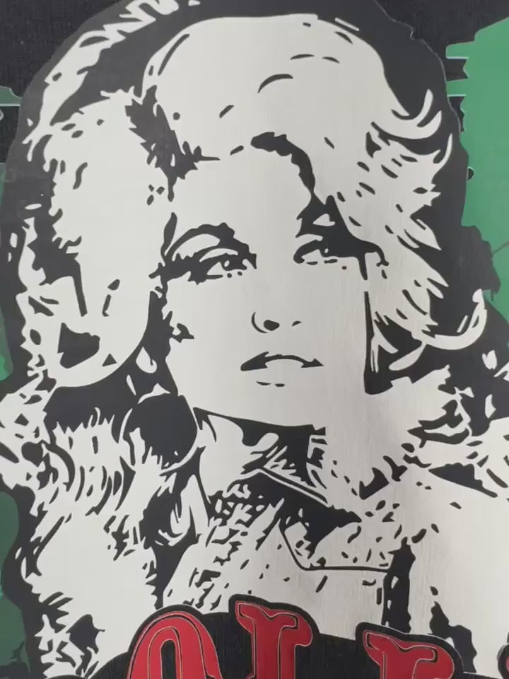 Holiday graphic tee featuring Dolly Parton portrait and Christmas charm