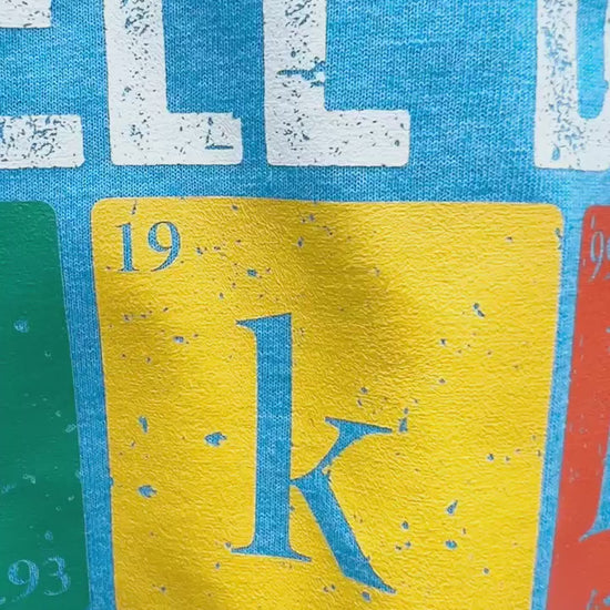 Video of actual product.  Blue Tshirt with the words "I Tell Dad Jokes Periodically But Only When I'm in my Element"