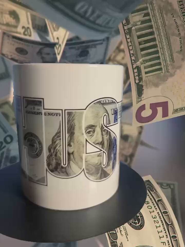 Mug on spinning stand with the words Hustle with money showering the background.