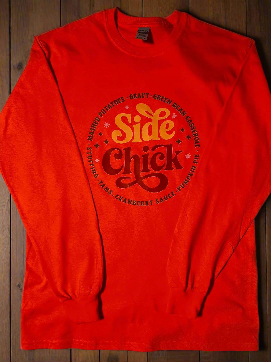 Front view of orange Side Chick Thanksgiving Tee with bold foodie graphic design