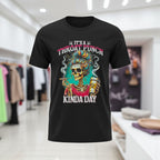 Black t-shirt with colorful graphic design and text in a store setting
