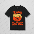 Black t-shirt with a pumpkin and text design on a white wooden background