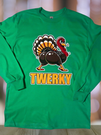 Close-up of turkey twerking graphic on green Ultra Cotton long sleeve Thanksgiving shirt.
