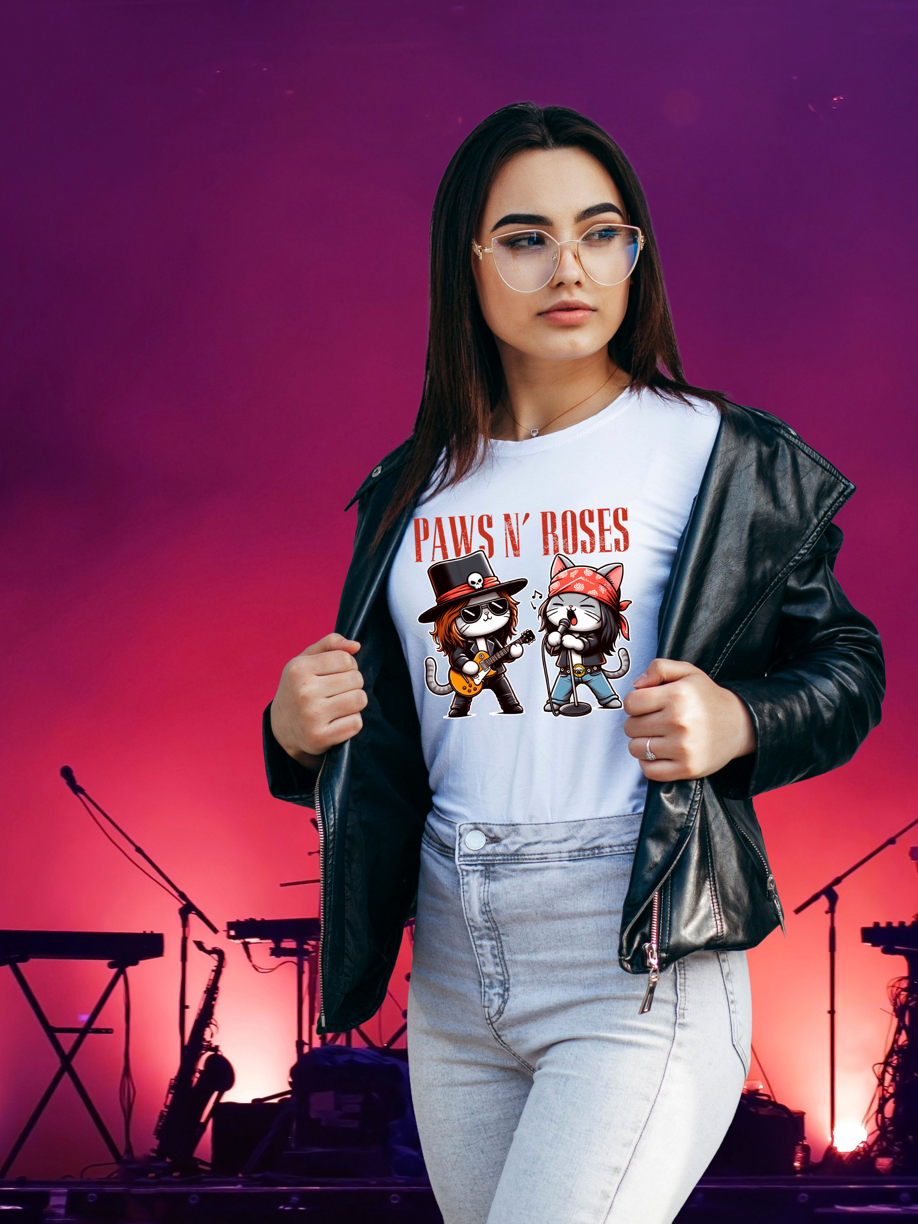 Woman wearing a 'Paws N' Roses' t-shirt with a concert stage in the background